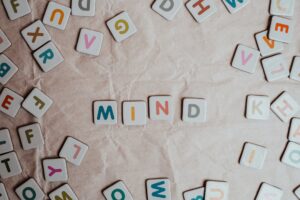 multicoloured letters on paper background